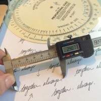 measuring the inscription, and using an old-school layout wheel to calculate how much to reduce it