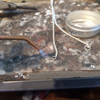 soldering the ends on the wheat chain
